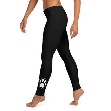Dog mom wearing black leggings with paw print women's size S