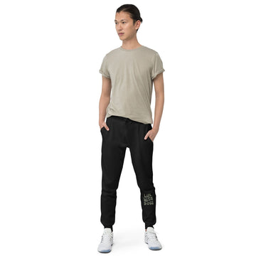 Man wearing black LIFE WITH DOGS fleece sweatpants showing comfortable fit and premium quality perfect for dog dads